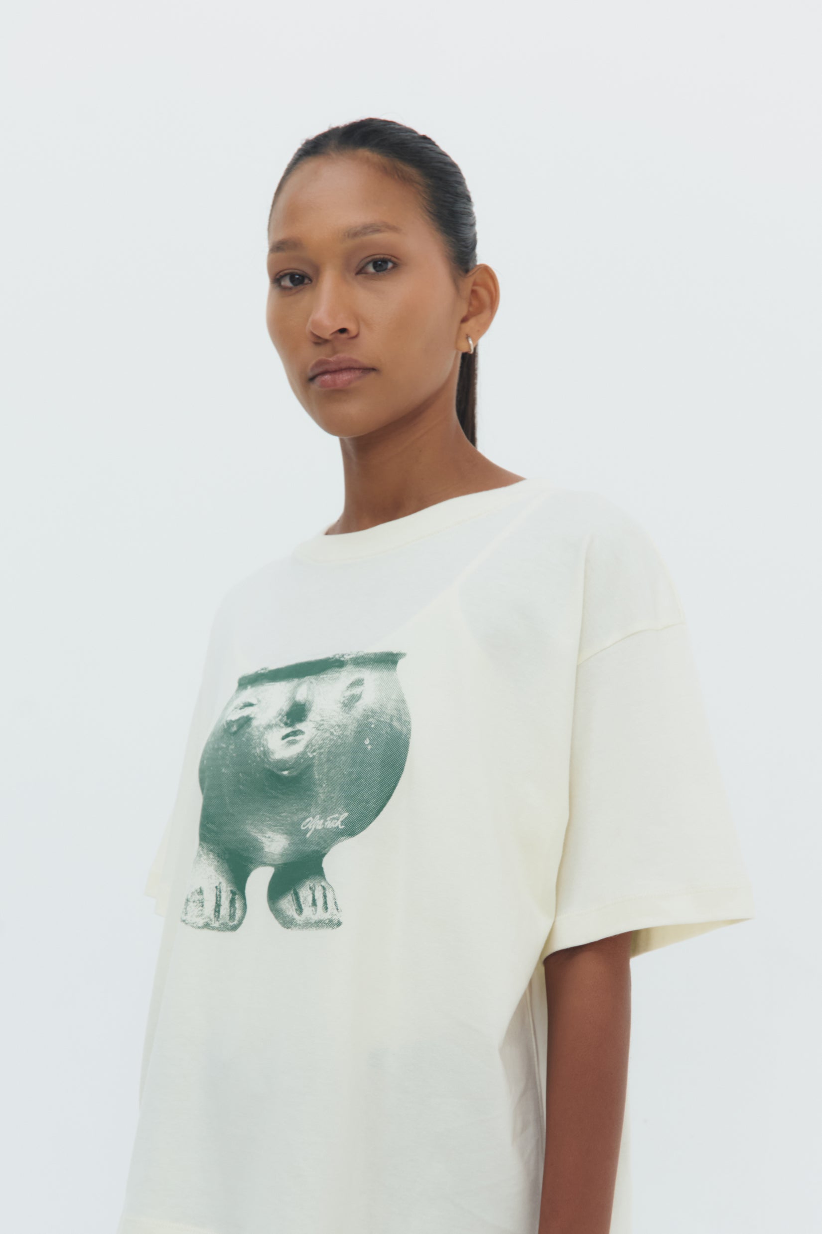 White cotton Pondo T-Shirt with Pre-Columbian inspired screen print, relaxed fit and crew neckline by Olga Fisch.
