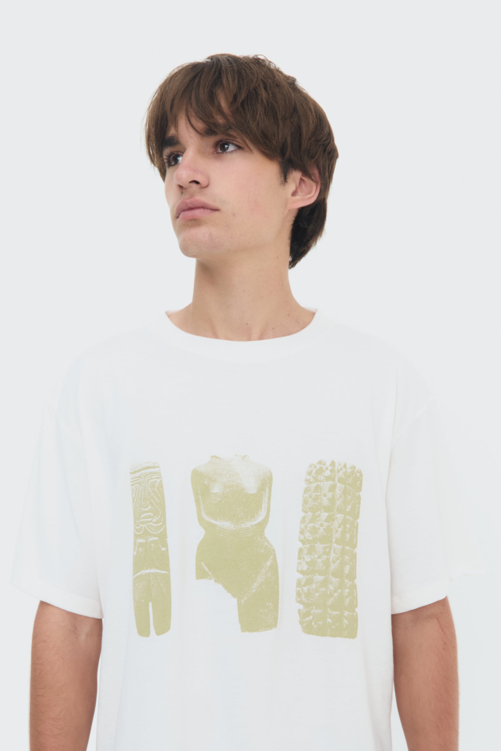 White cotton Sellos T-Shirt with Pre-Columbian inspired screen print, relaxed fit and crew neckline by Olga Fisch.