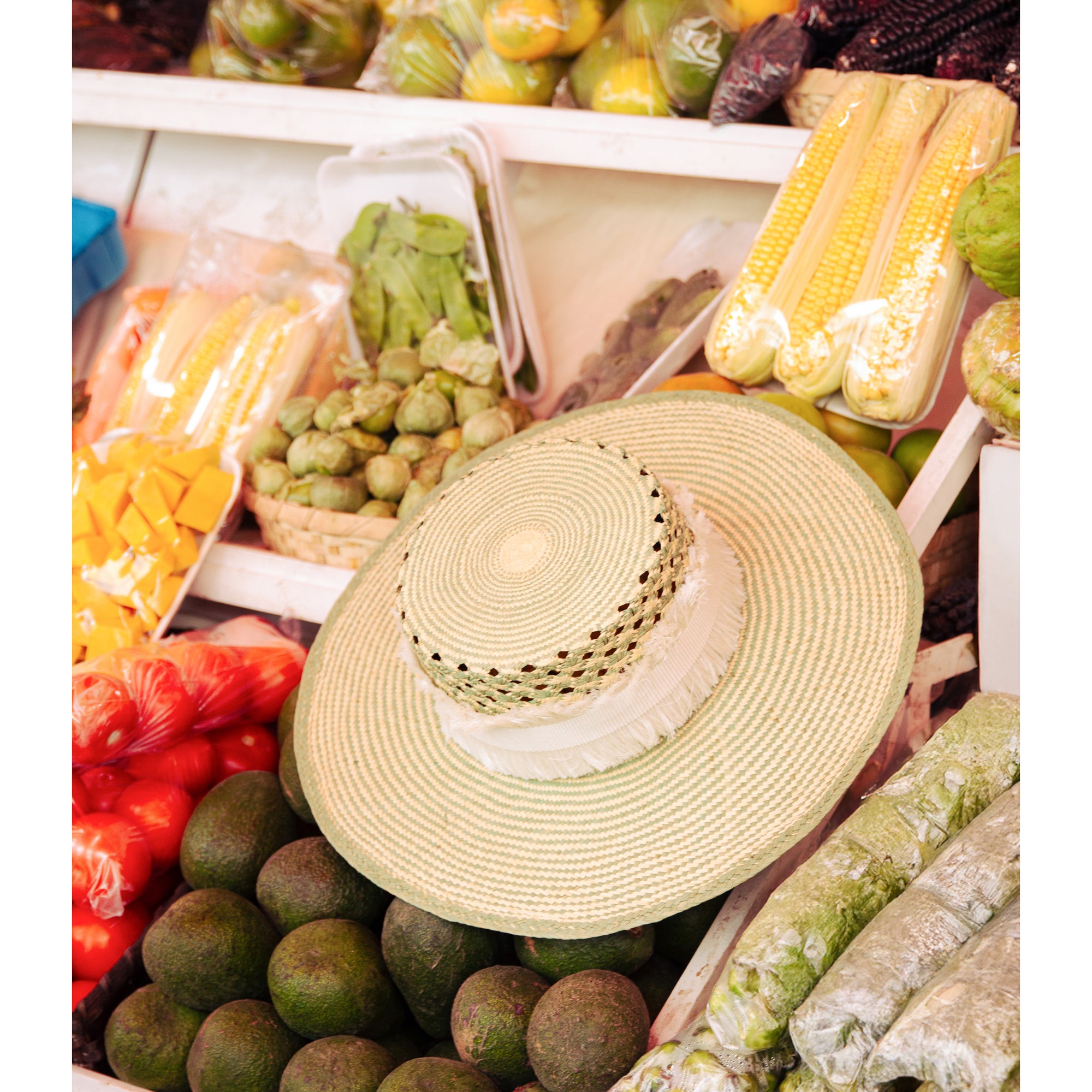 Feautering our Aguacate Straw Hat by Olga Fisch – handwoven toquilla straw with cotton ribbon
