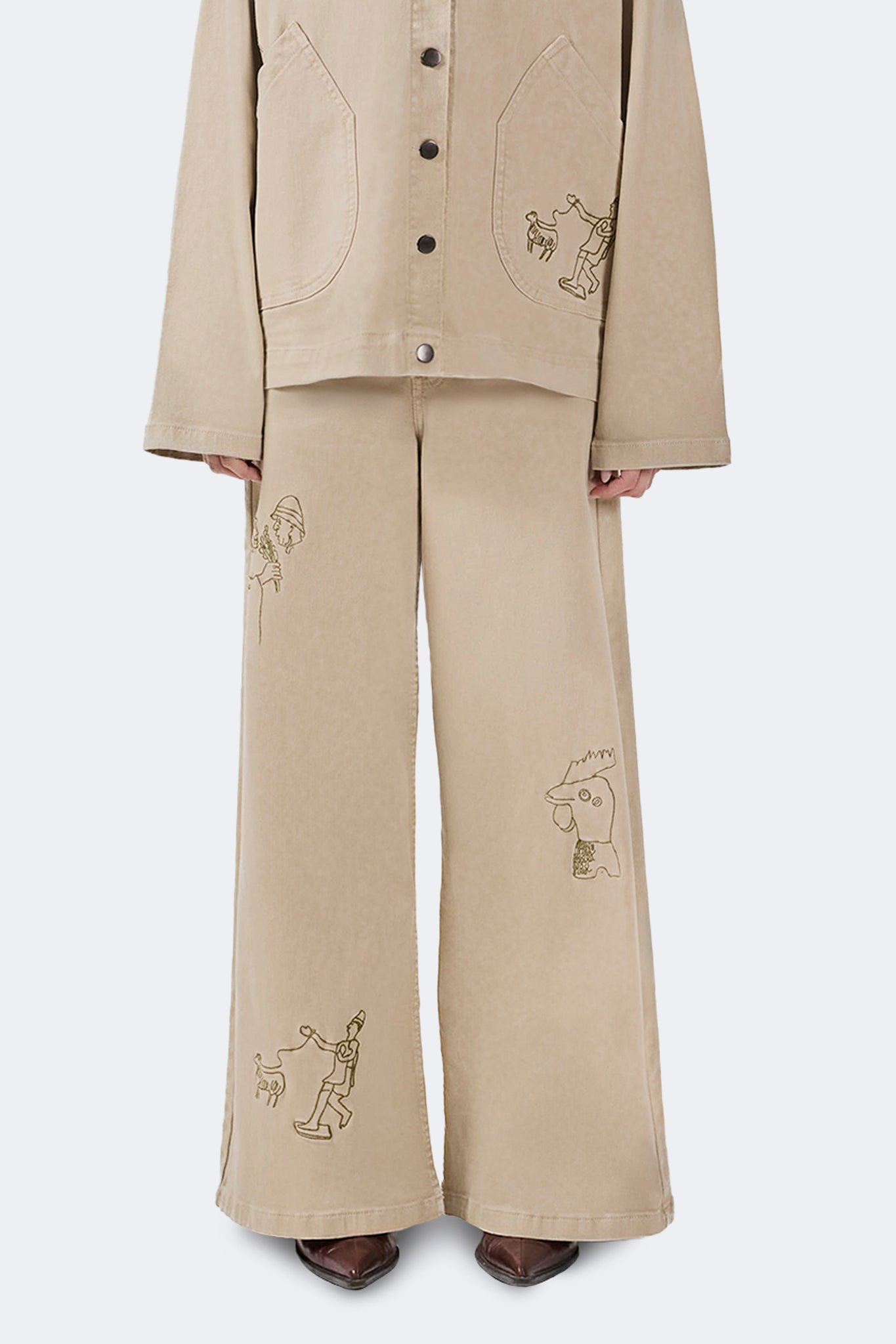 Front detail of the Allpa Cream embroidered cotton denim wide-leg jeans.