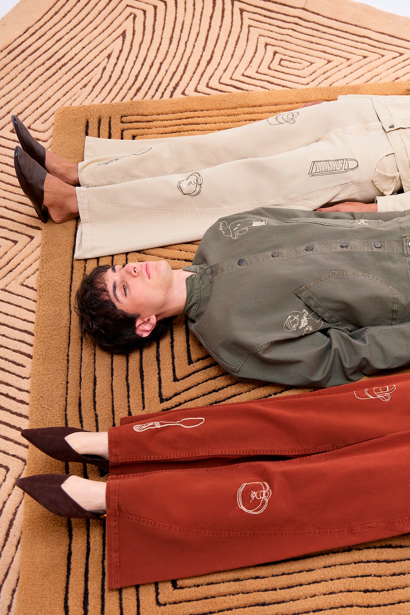Allpa Mandarin Jacket in Moss with archive-inspired embroidery and Payla Jeans Cream and Brick.