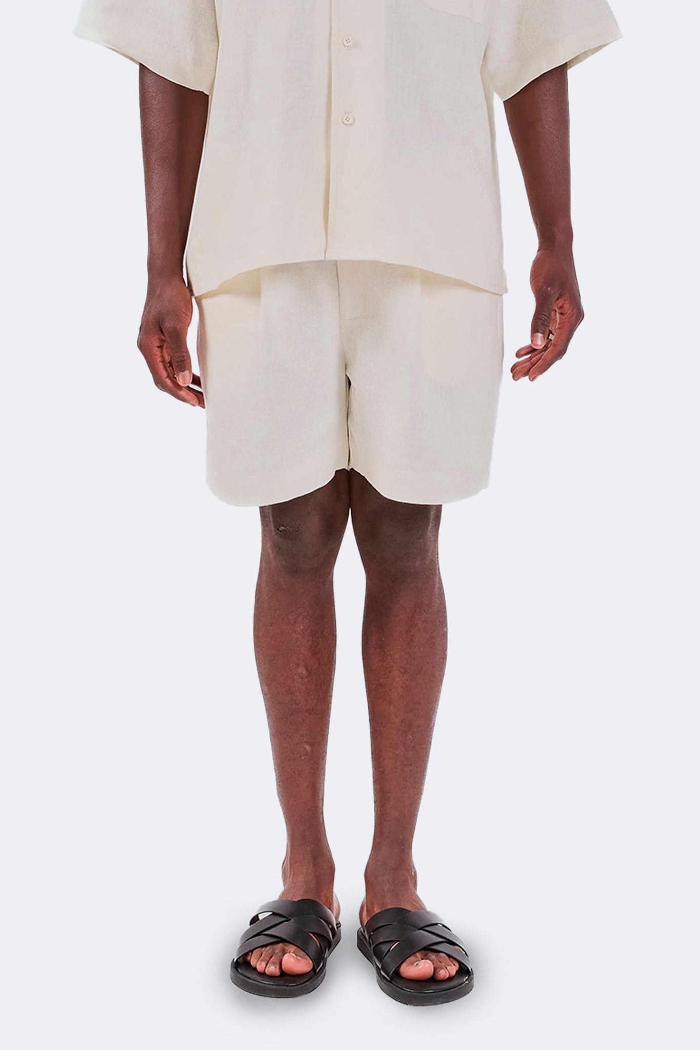 Front detail of Baltra Linen Shorts Ivory crafted from breathable 100% linen.
