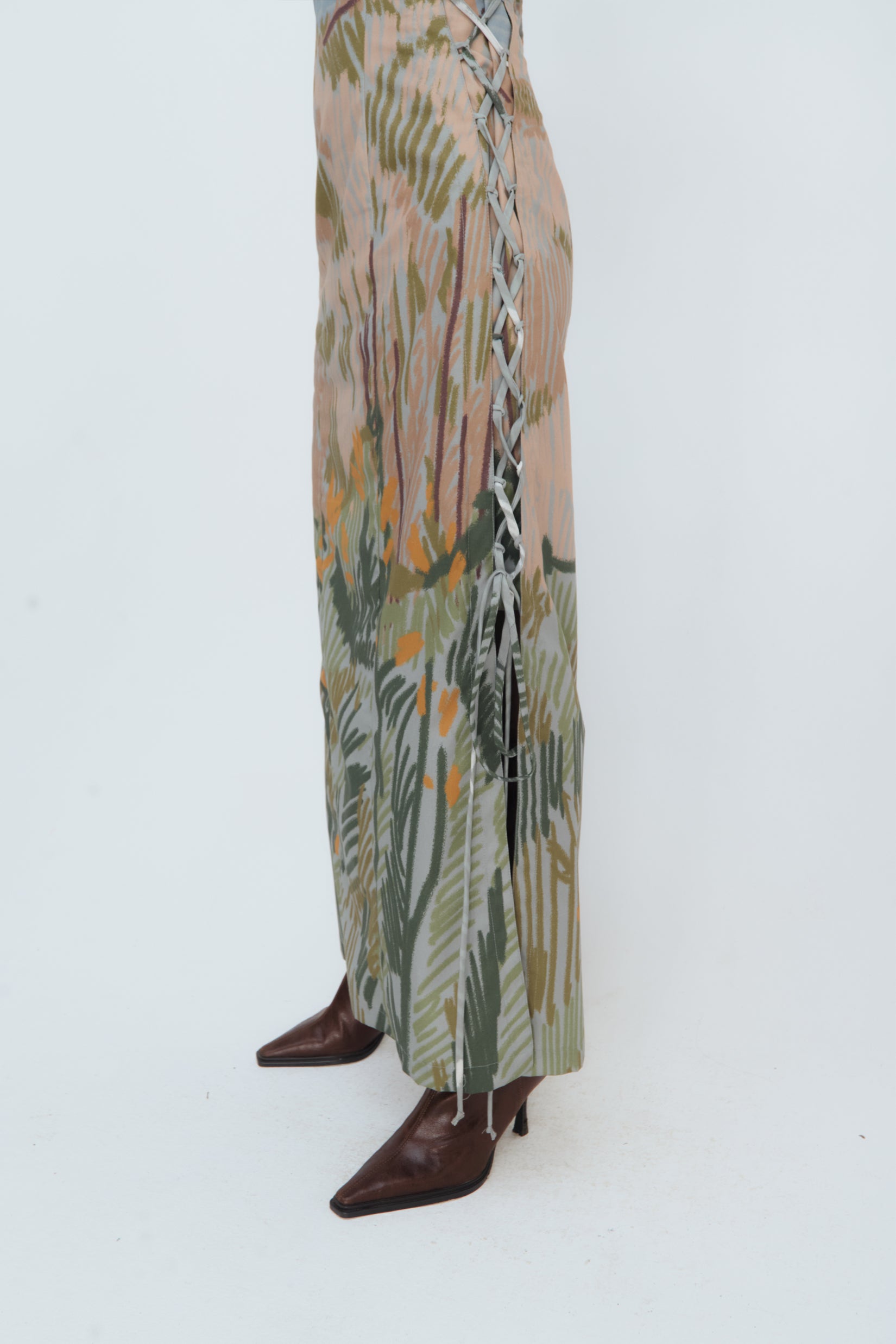 Detail of cotton and lace fabric with abstract Andean print