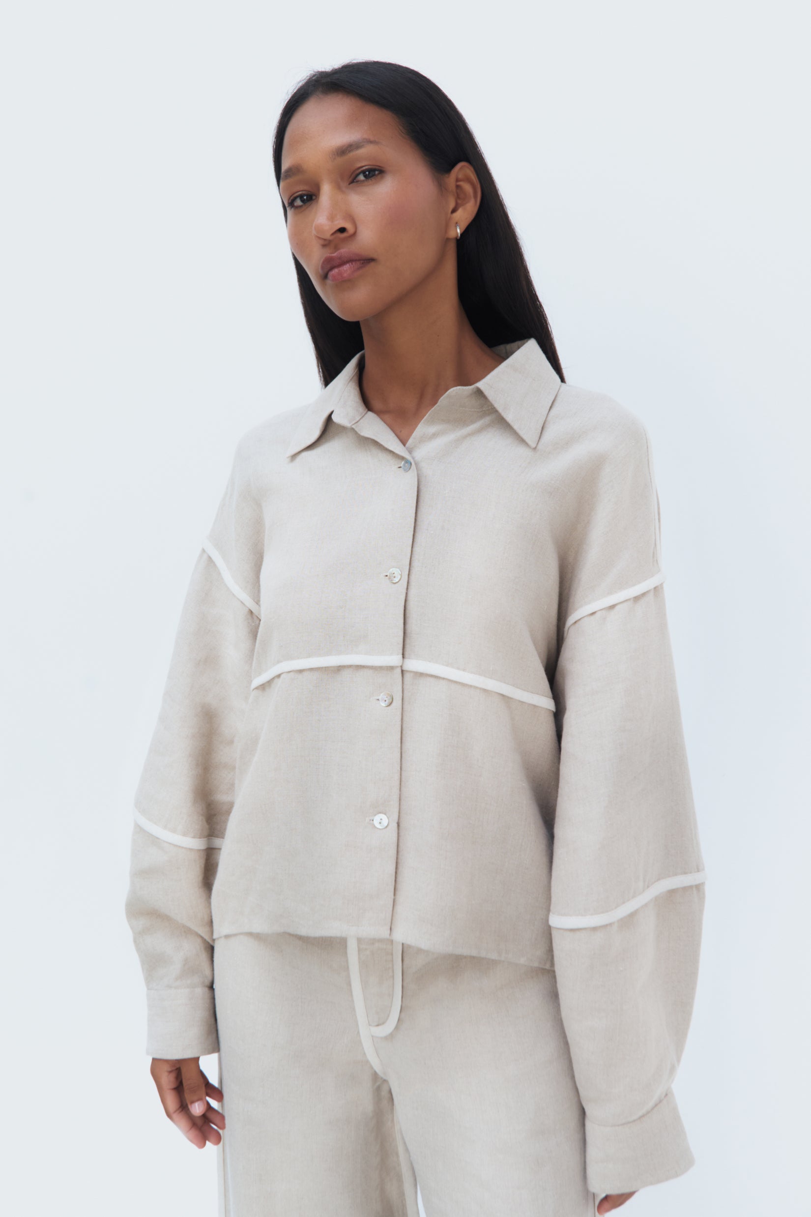 Close up of Duna Piped Blouse – relaxed fit and clean lines