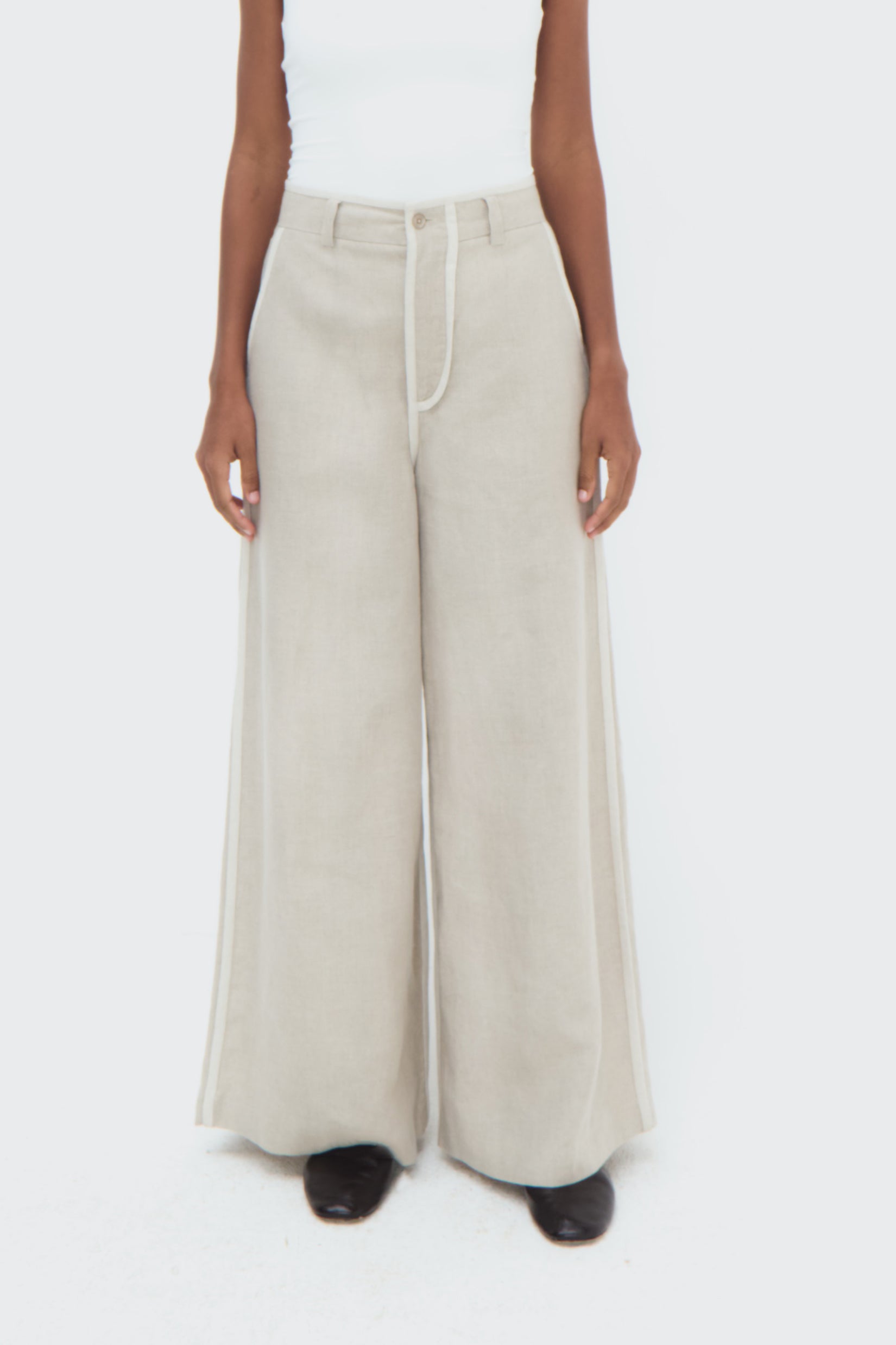 Duna Pipped Trousers by Olga Fisch – wide-leg linen pants with piping