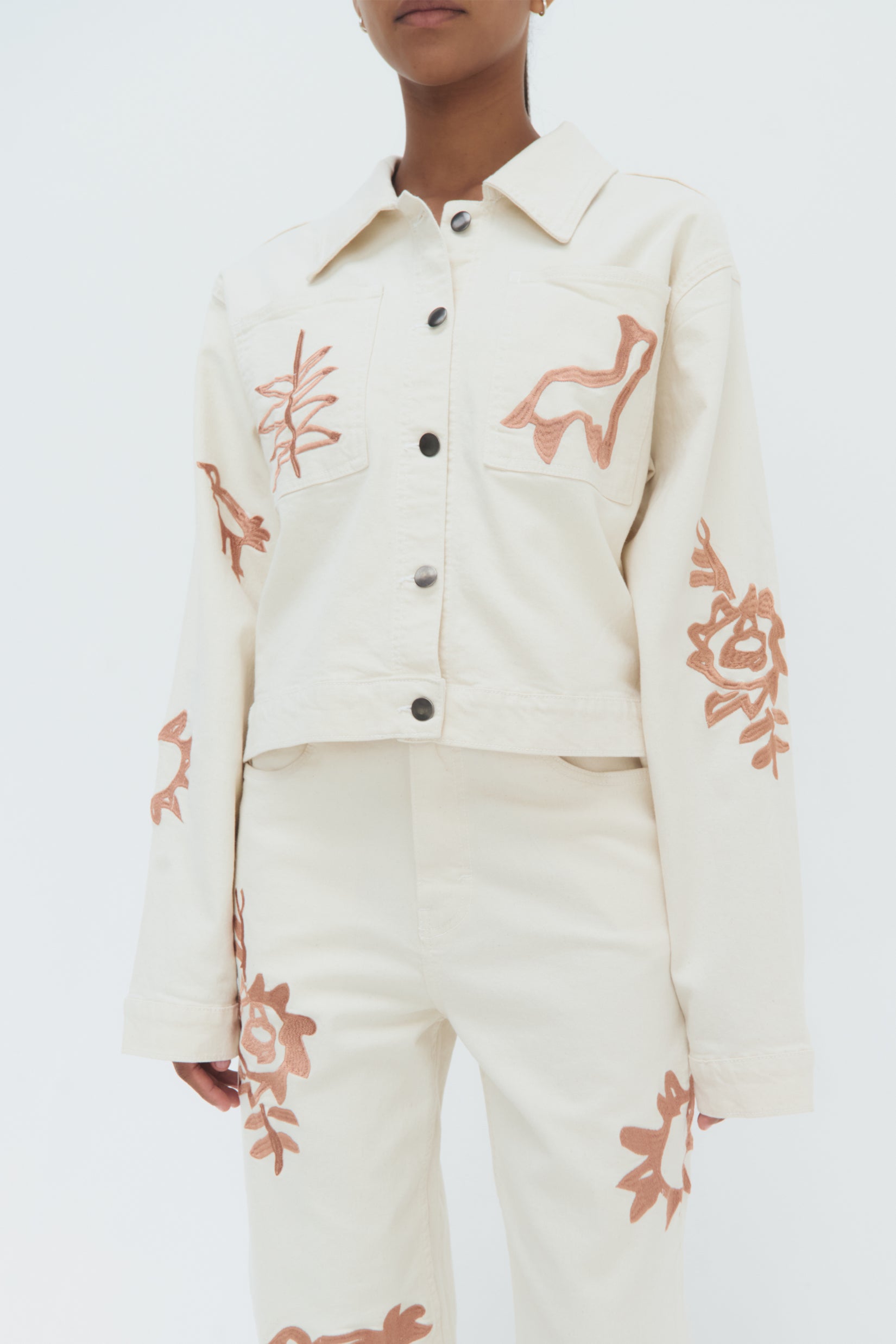 Detail of Iconos Cropped Jacket – structured silhouette and embroidery details