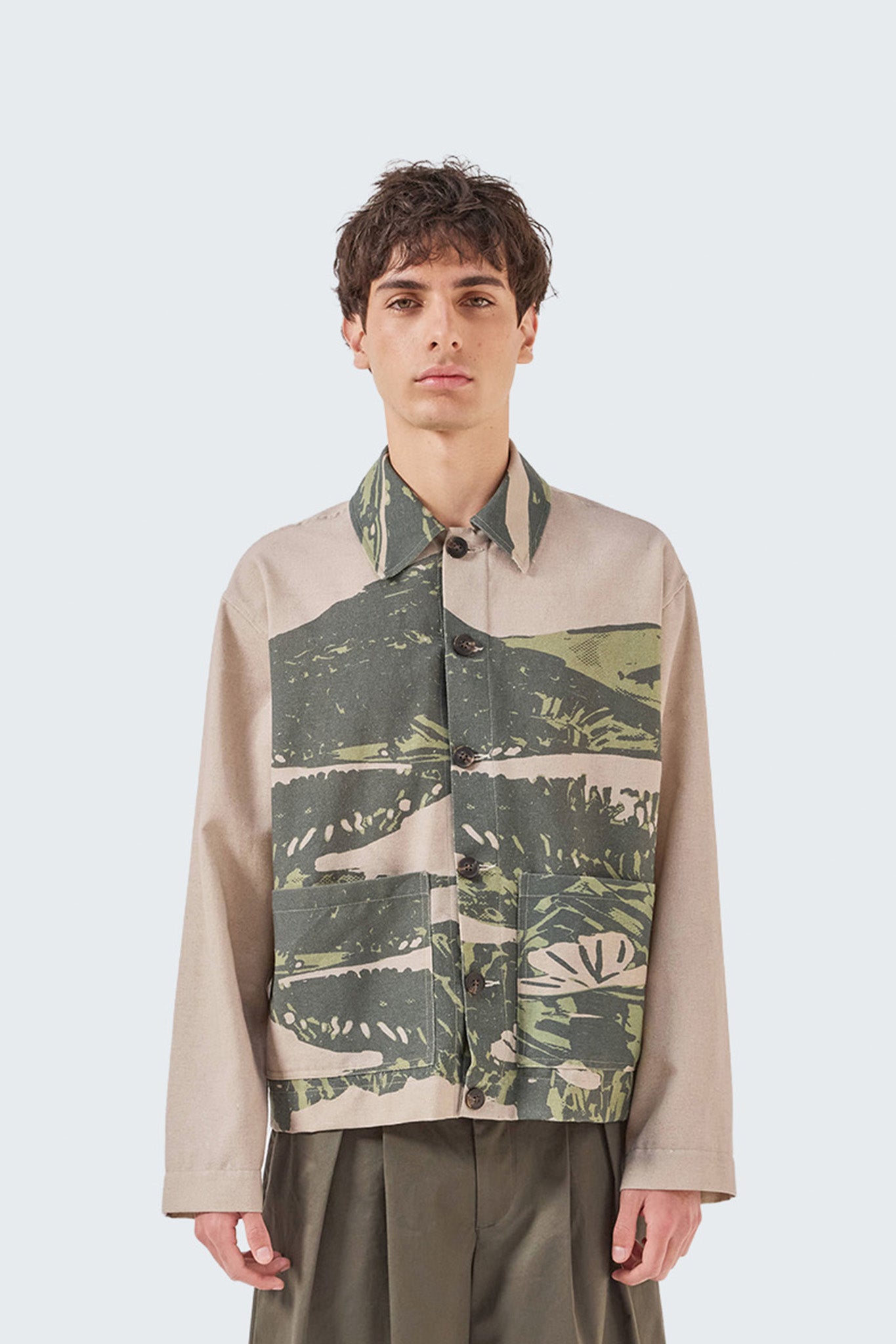 Detailed front view of the Kikuyo Workman Jacket highlighting custom landscape artwork, patch pockets, and linen construction.