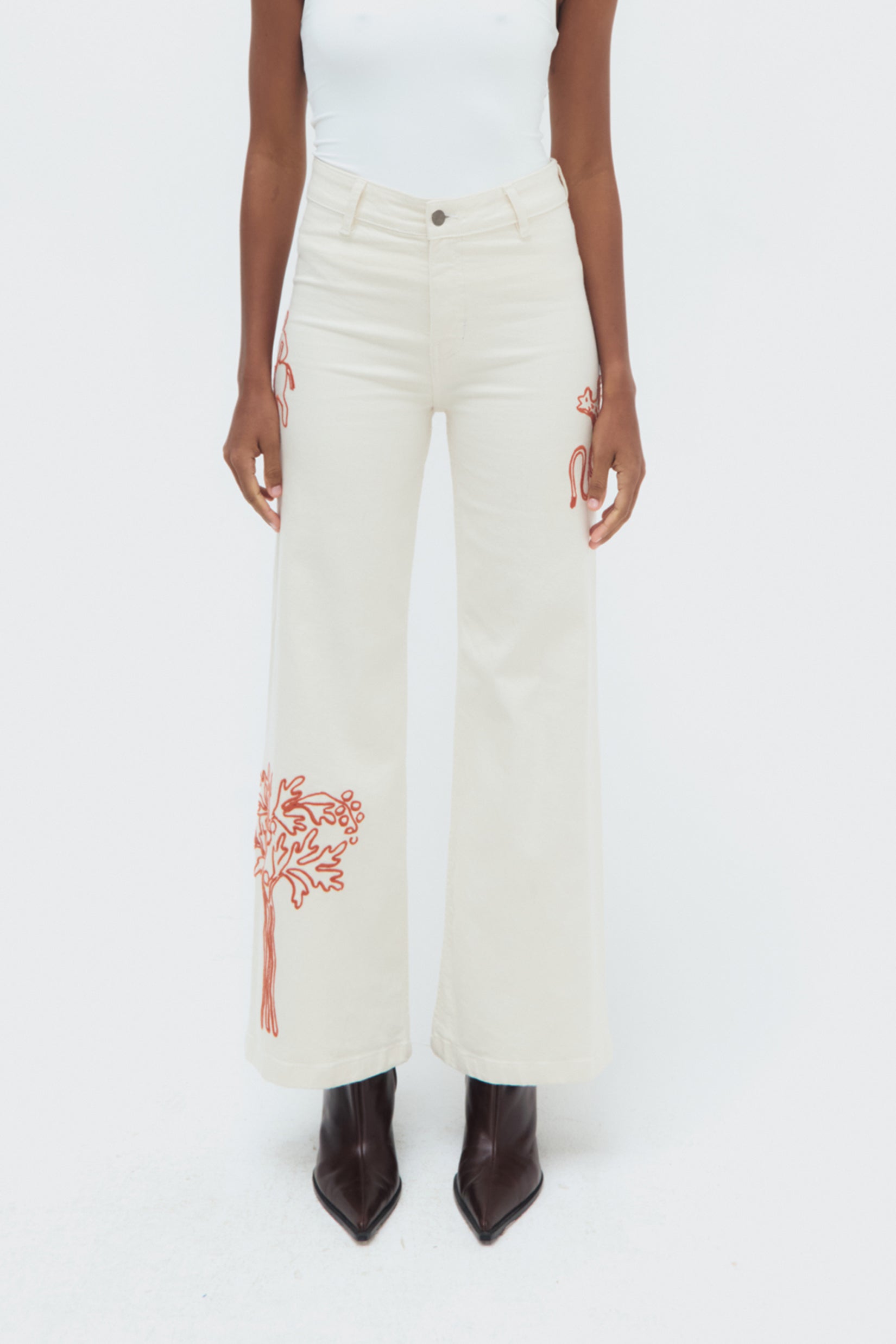 Front view of Munay Jeans by Olga Fisch showing embroidered details on cotton denim