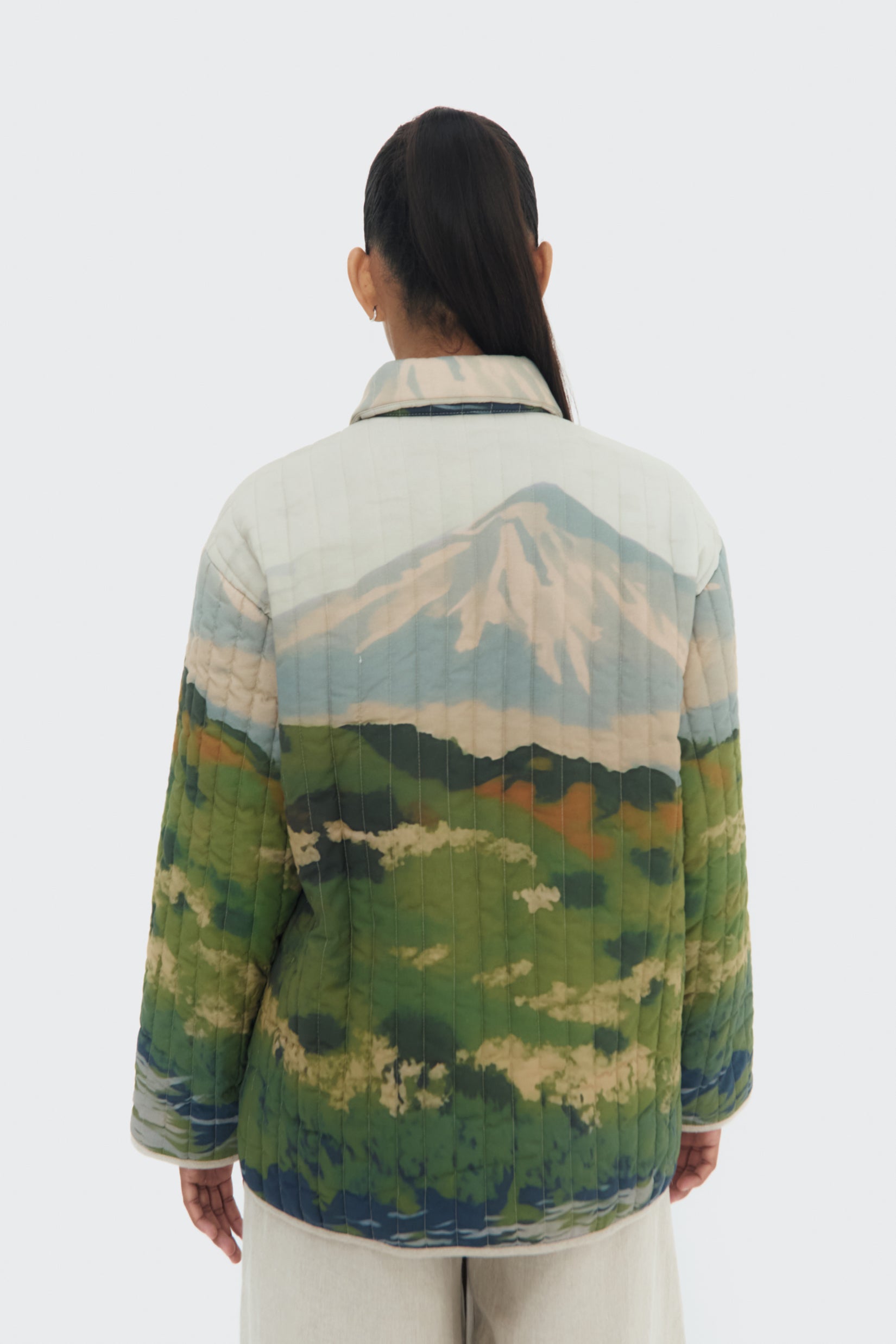 Back view of the Bruma Utility Jacket by Olga Fisch featuring an abstract landscape print