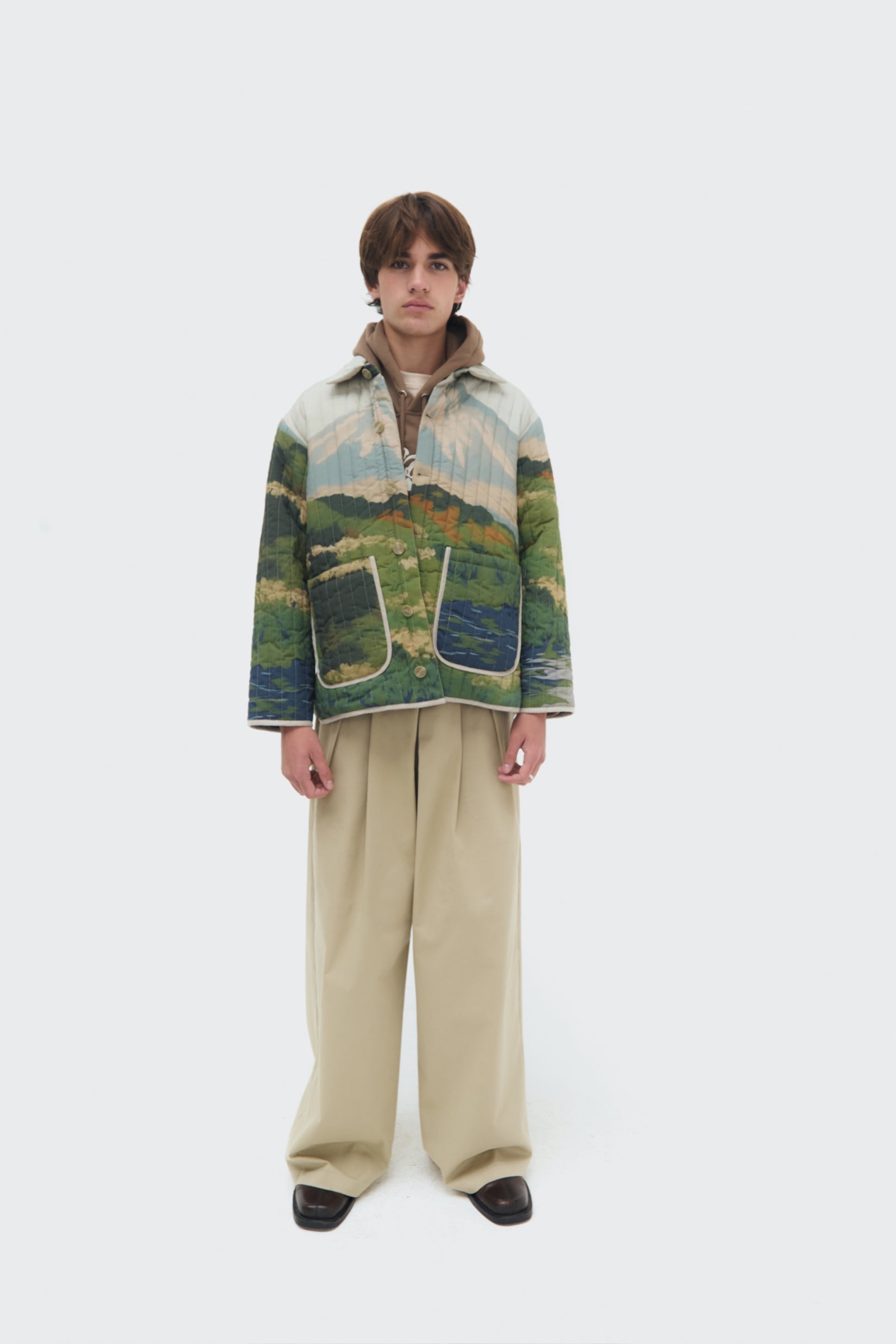 Male Front view of the Bruma Utility Jacket by Olga Fisch featuring an abstract landscape print