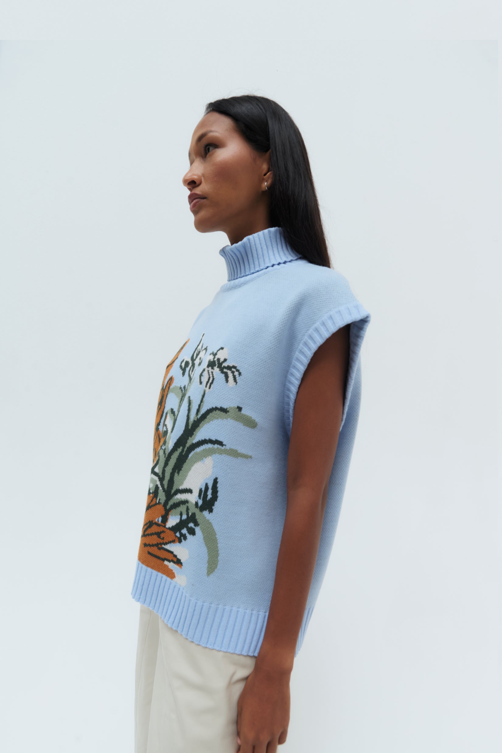 Páramo Sweater Vest by Olga Fisch – blue sleeveless knit with botanical desig