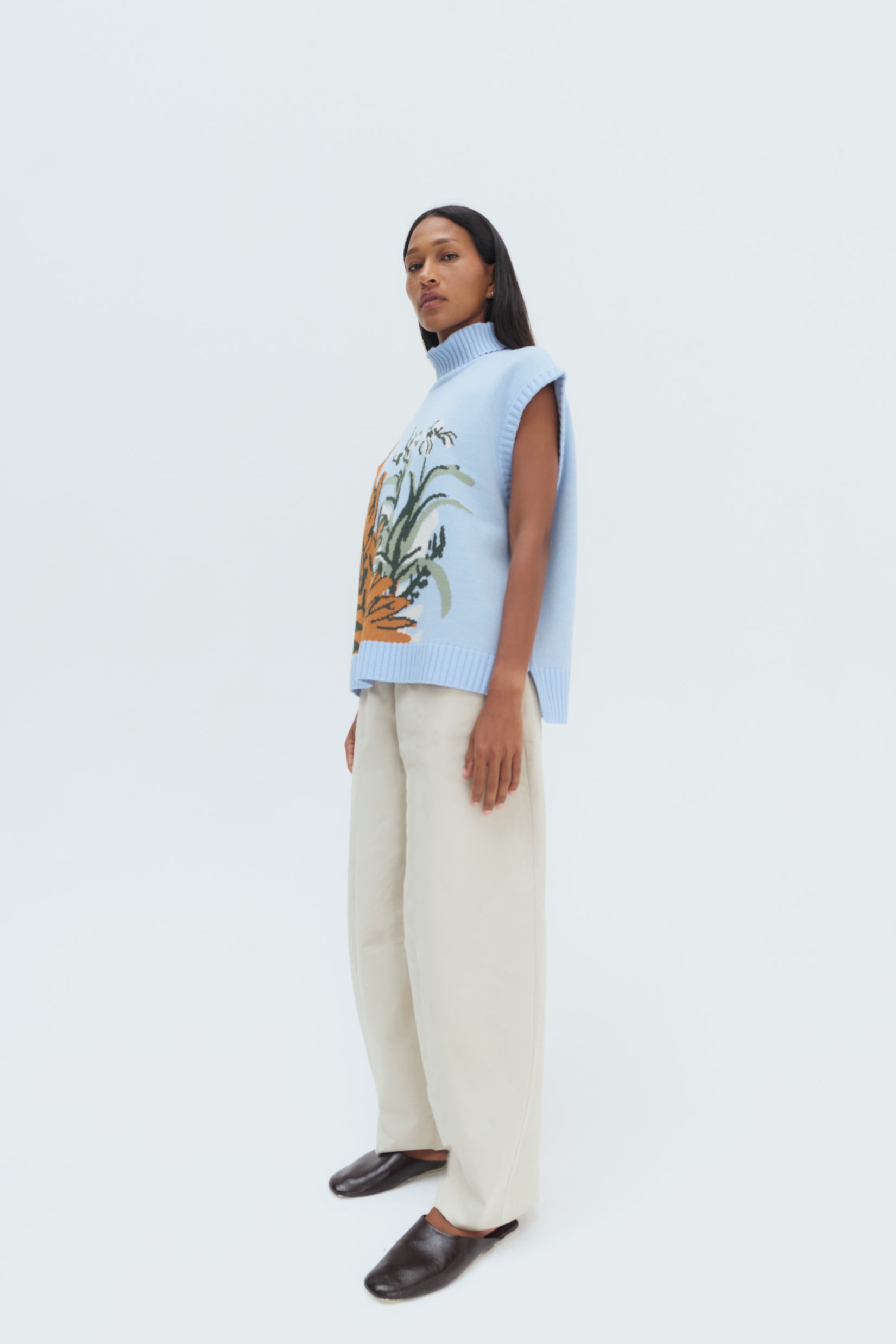 Páramo Sweater Vest by Olga Fisch – blue sleeveless knit with botanical desig