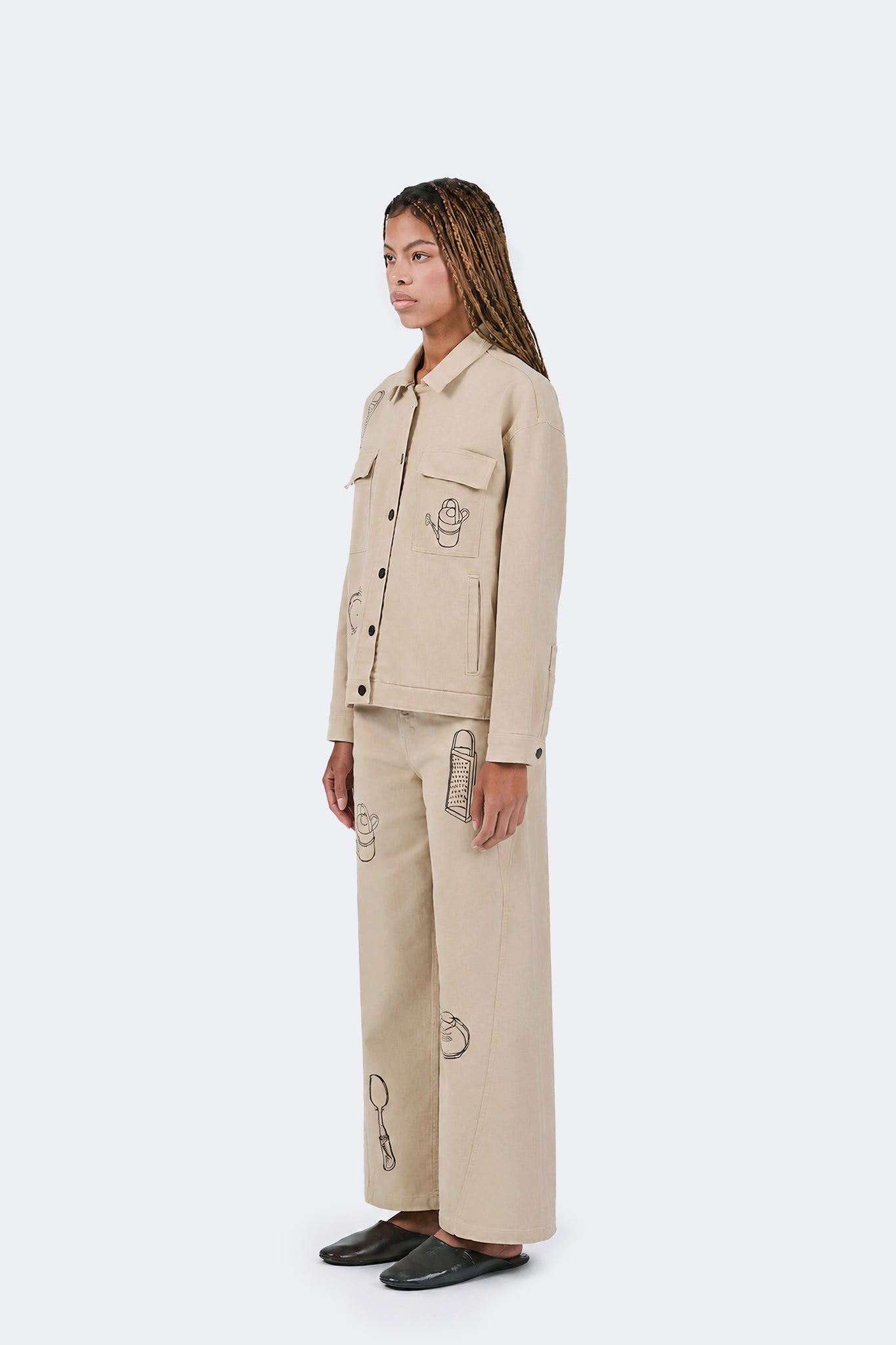 Side view of the Payla Workman Jacket in Cream.