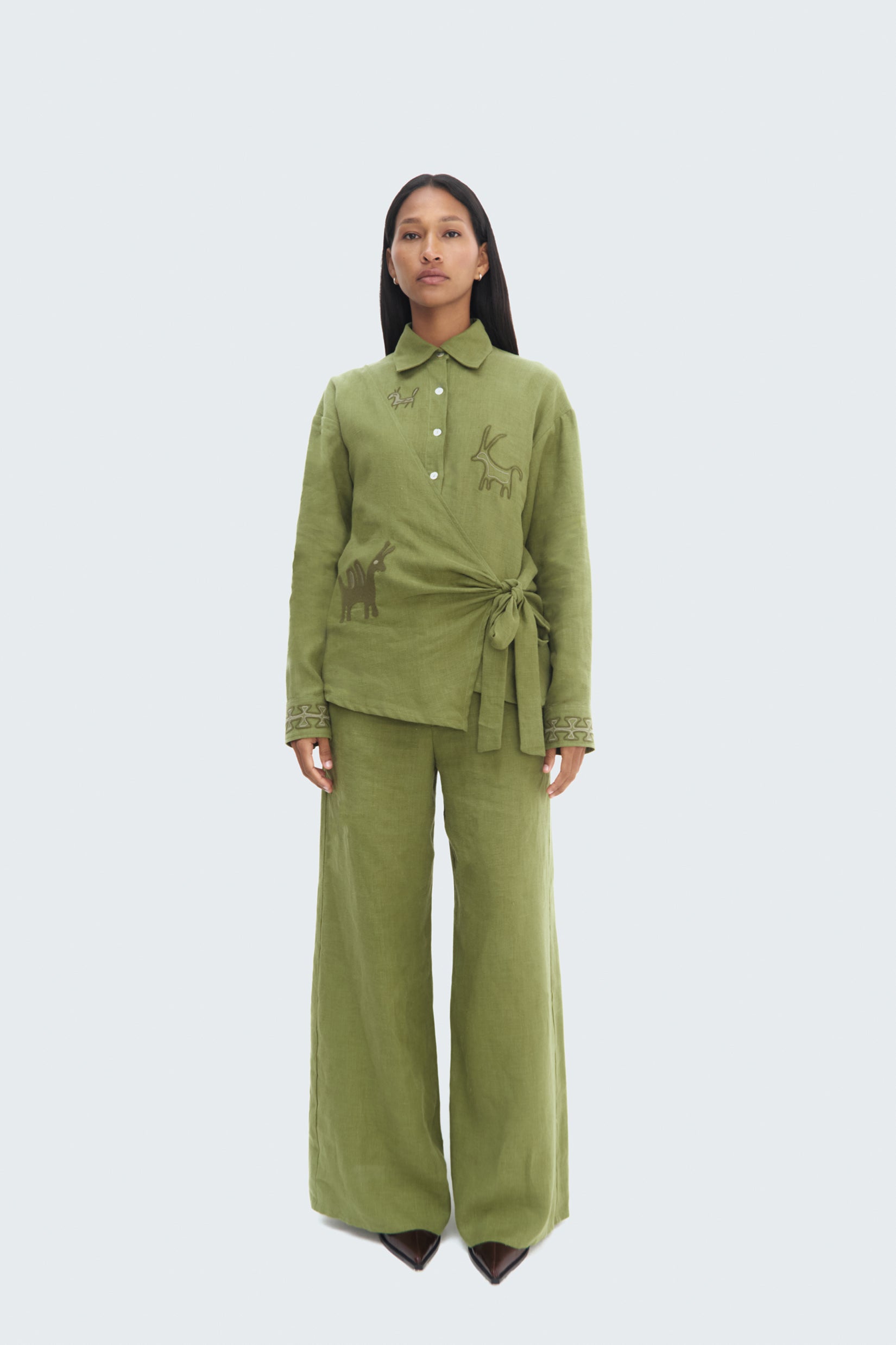 Model Total Look Pilche Wrapped Blouse by Olga Fisch – linen wrap top with embroidered details