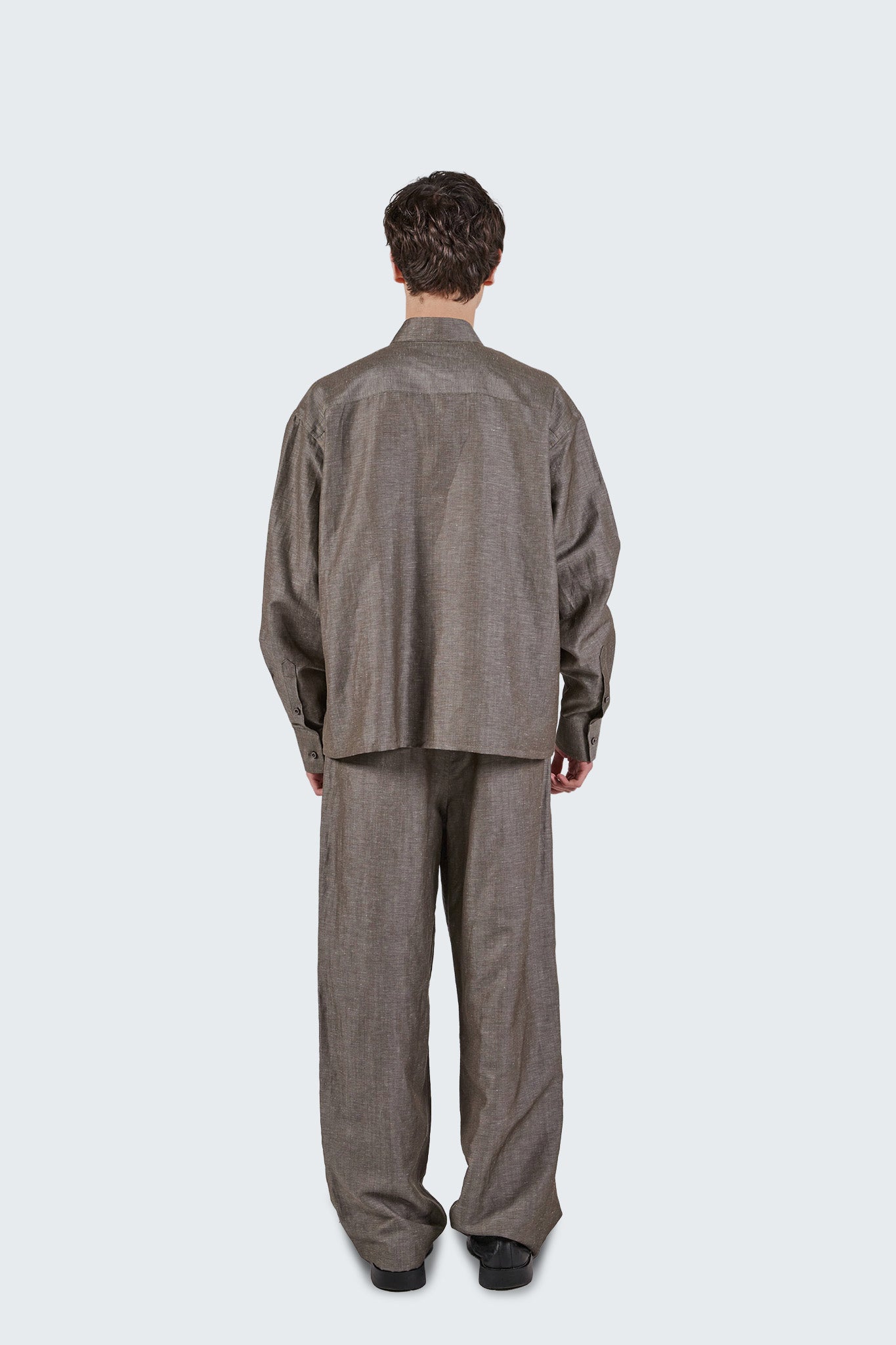 Full back view of the Pita Mao Collared Shirt in grey with relaxed silhouette and lightweight wool-linen fabric.