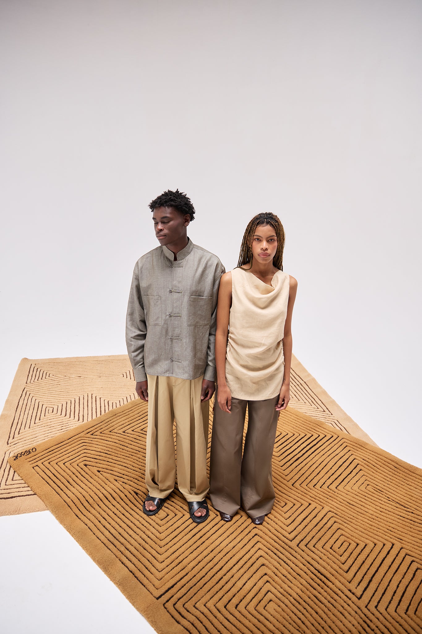 Pita Mao Collared Shirt in Grey styled with matching trousers, front editorial view.