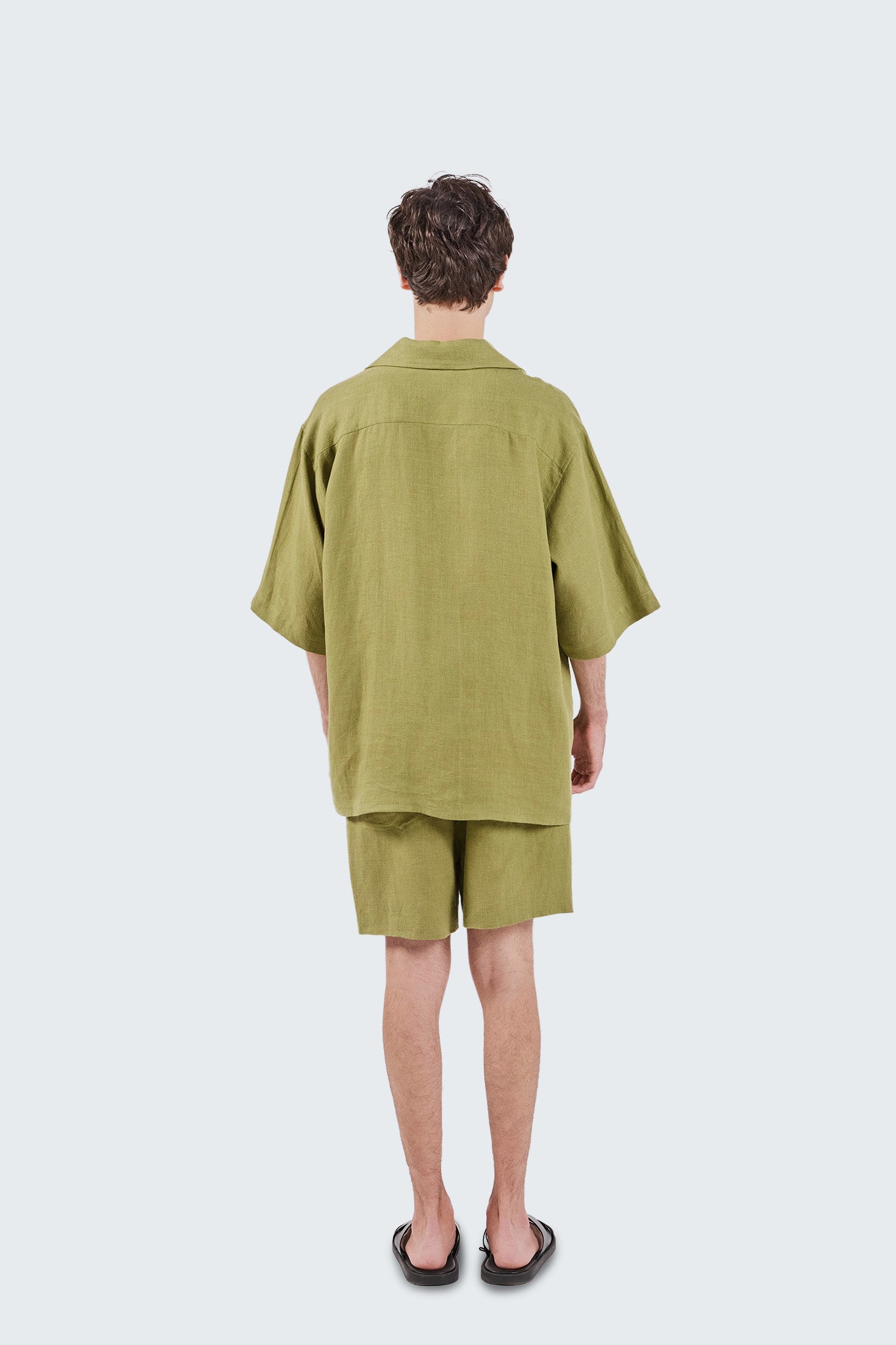 Back view of San Cristobal Linen Shorts showing a relaxed fit, clean lines, and minimalist tailoring.