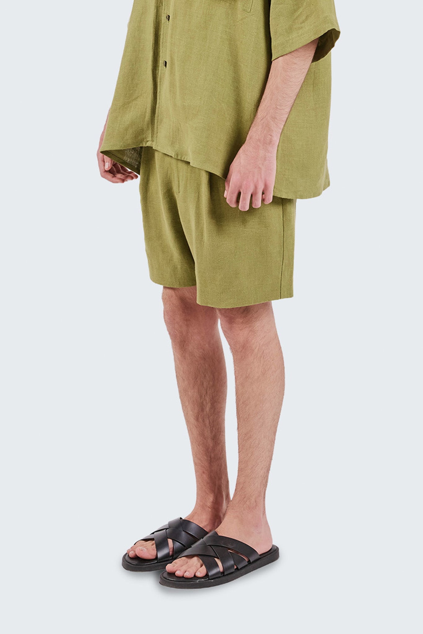 Close-up side view of San Cristobal Linen Shorts showcasing the natural linen texture and relaxed silhouette.