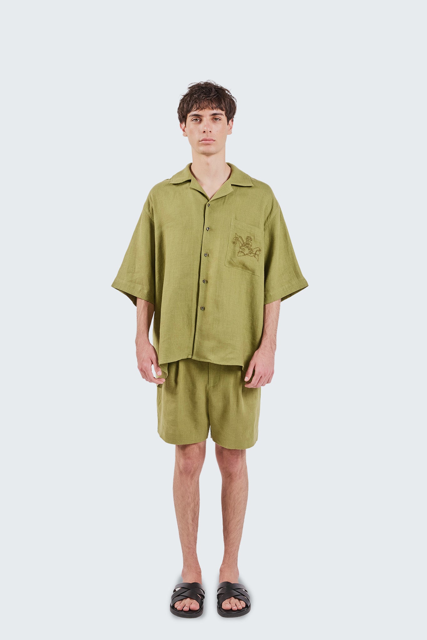 Front view of the San Cristobal Short-Sleeved Shirt in Moss with camp collar, button-front closure, and relaxed fit.