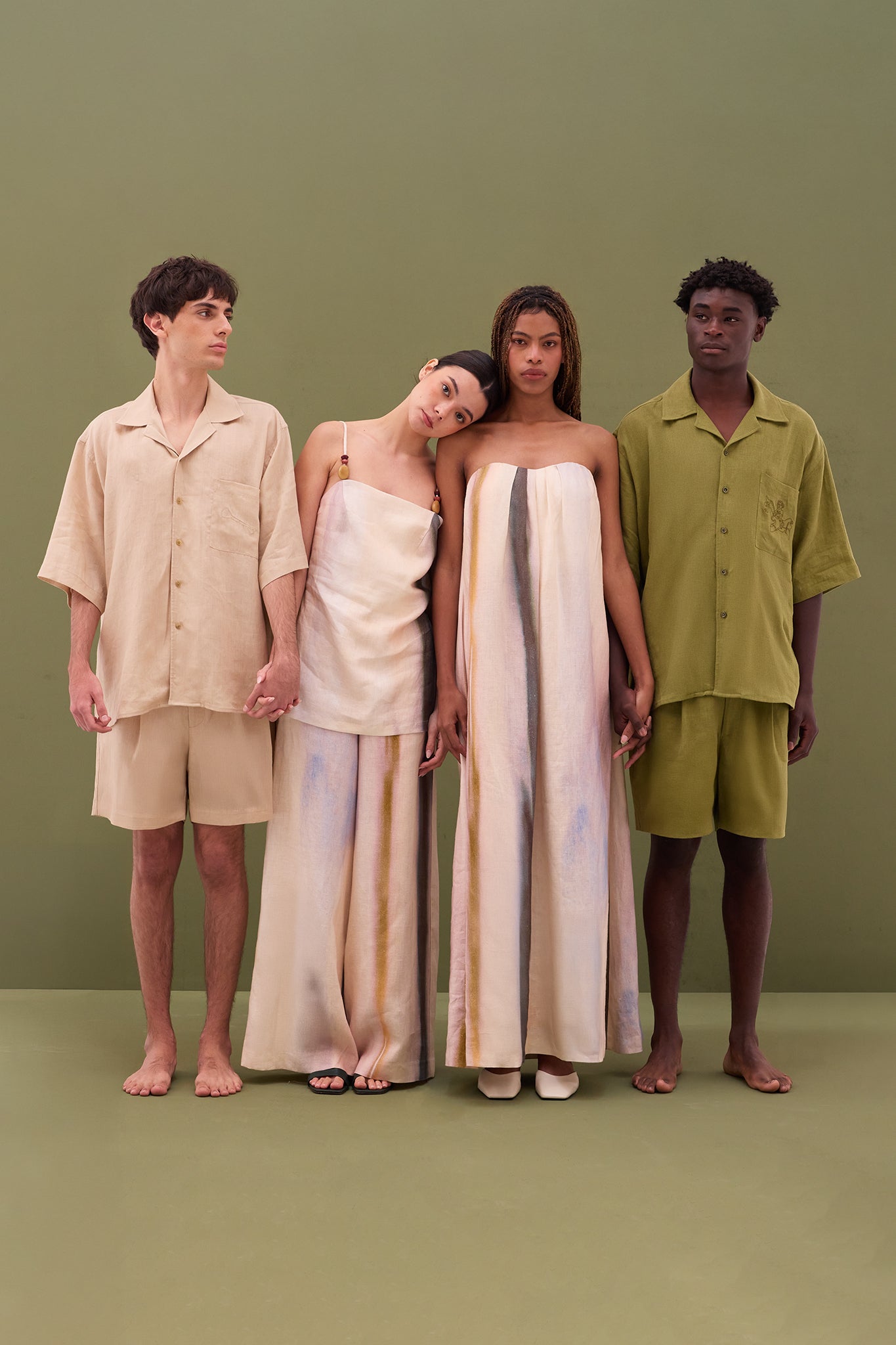 San Cristobal Linen Shorts and Shirt in Moss styled with matching linen shirt in editorial campaign.