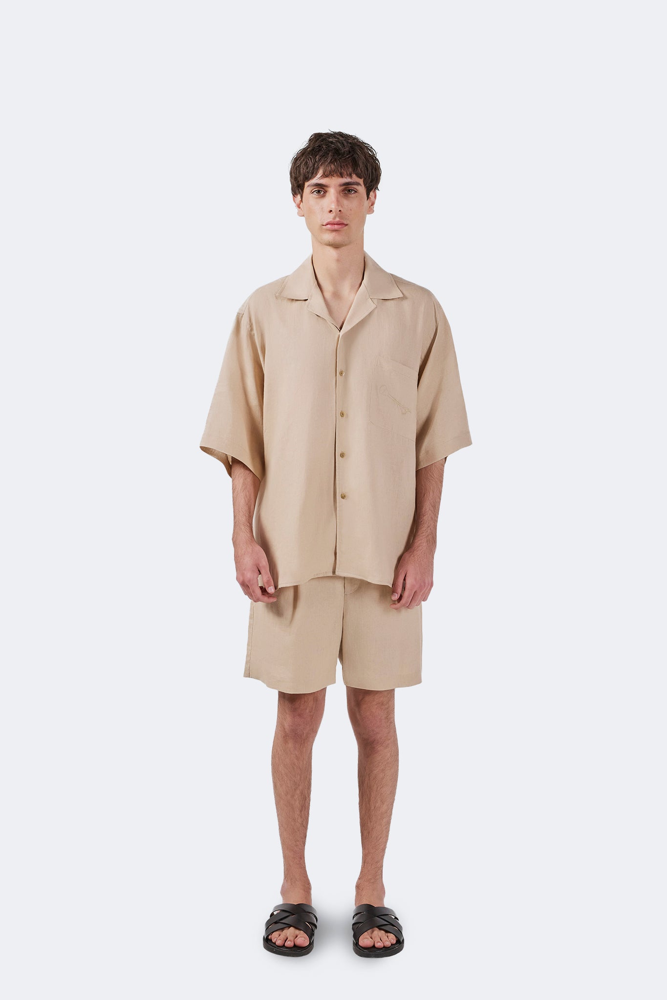 Front view of the Santa Cruz Short-Sleeved Shirt Ivory crafted from breathable 100% linen with a relaxed fit.