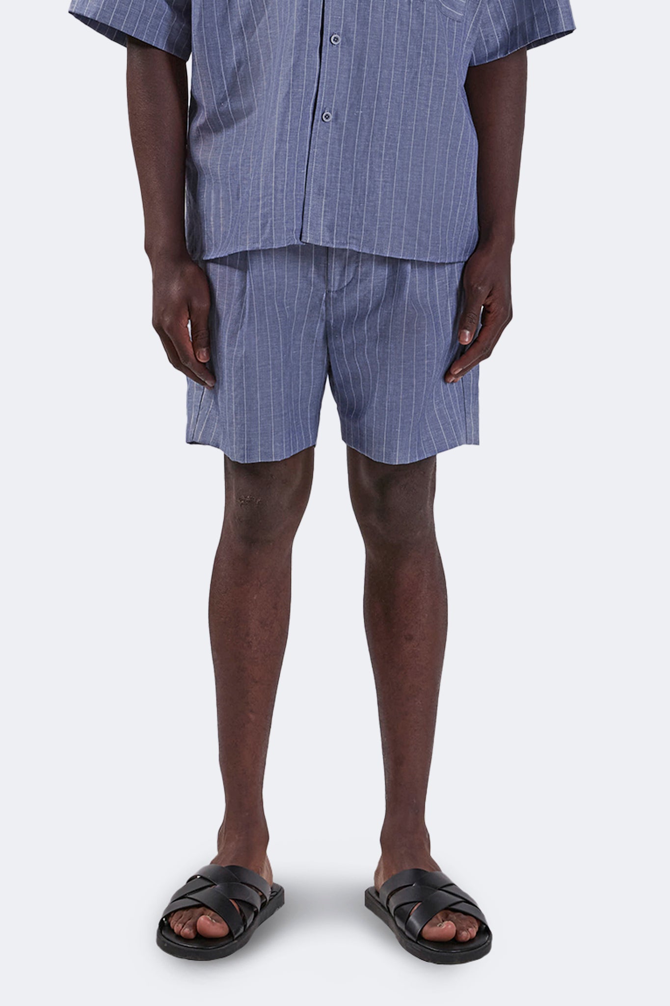 Front detail of the Santa Cruz Linen Shorts Indigo showcasing the relaxed silhouette, clean front finish, and lightweight linen construction.