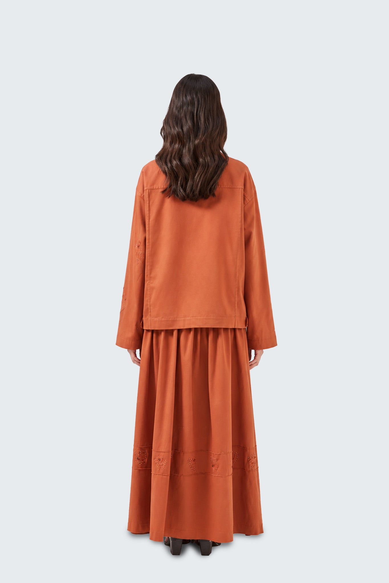 Back view of the Tolita High-Waisted Long Gathered Skirt highlighting its voluminous shape and fluid movement.