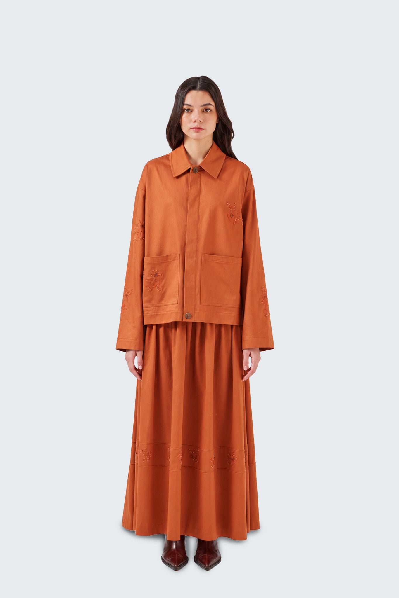 Front view of the Tolita High-Waisted Long Gathered Skirt showcasing its high-waisted fit and flowing maxi silhouette.