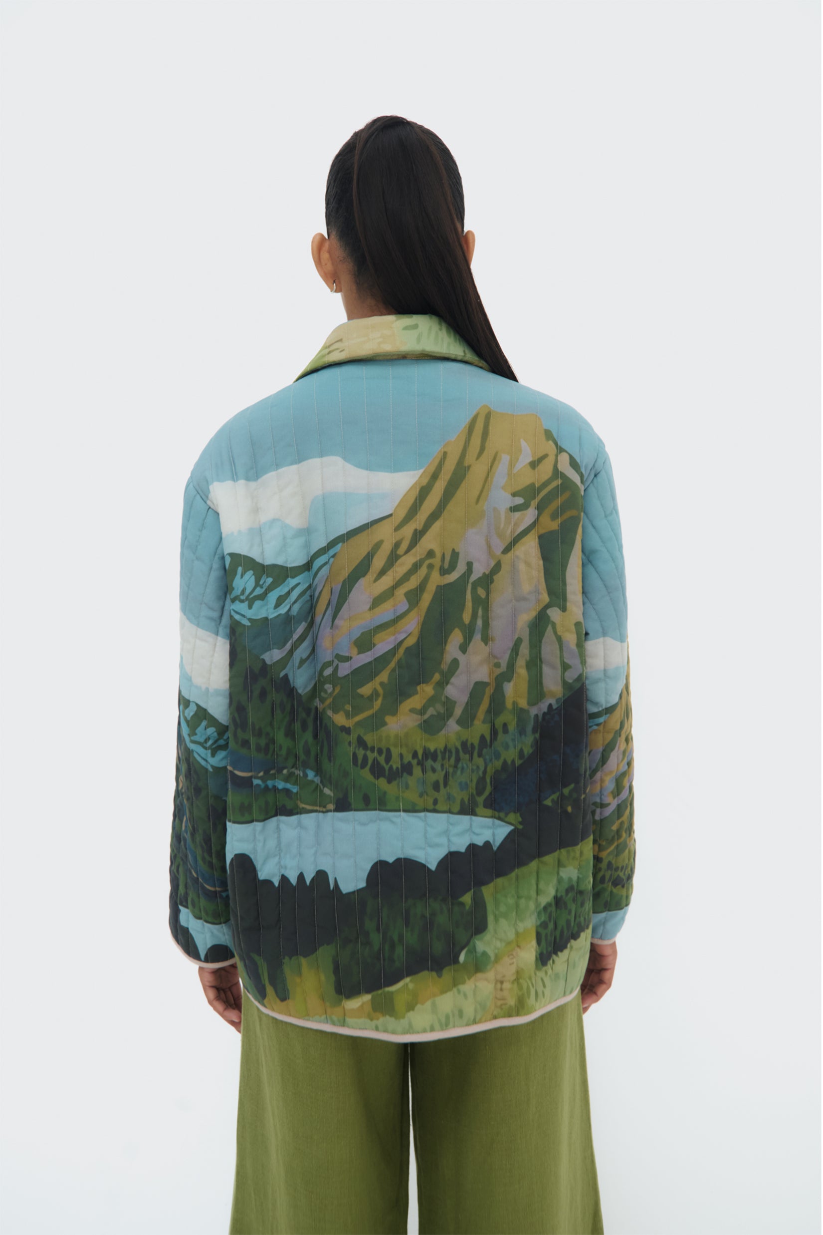 Back view of Bruma Quilted Jacket – oversized fit and vertical quilted stitching