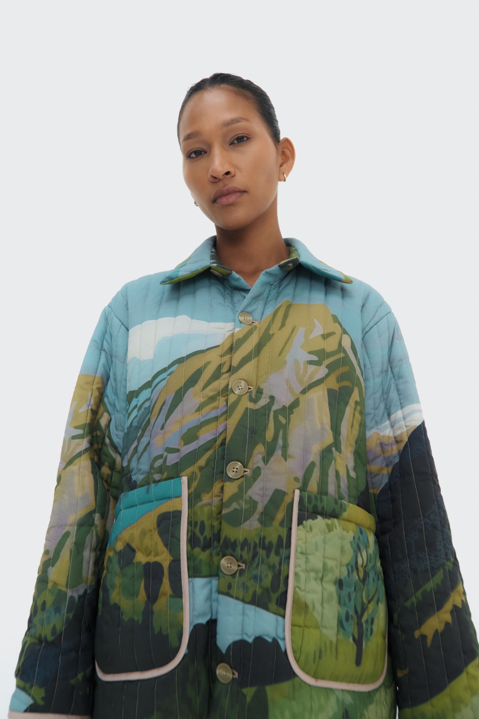 Detail view of Bruma Quilted Jacket – oversized fit and vertical quilted stitching