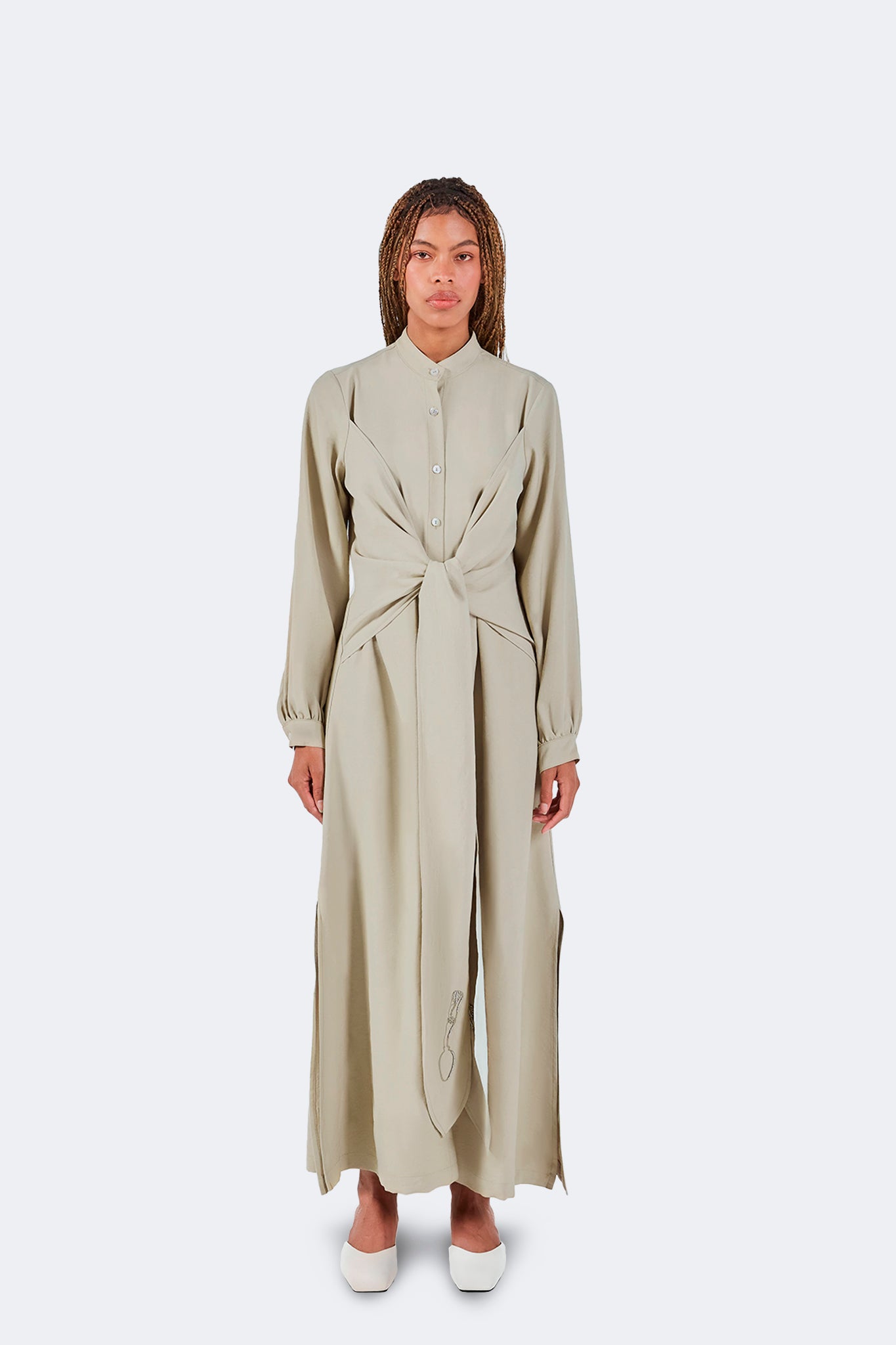 Zigze Knotted Dress in Baby Moss featuring a full-length silhouette, signature front knot detail, elongated draped ties, and fluid movement.